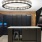 a room with a desk and chairs