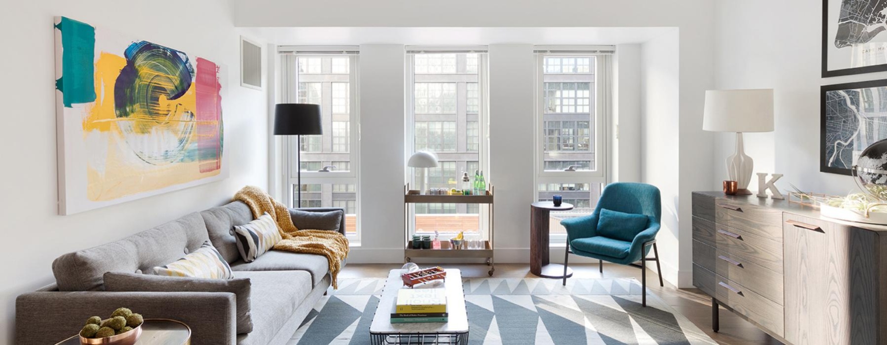 a living room with a couch and a table