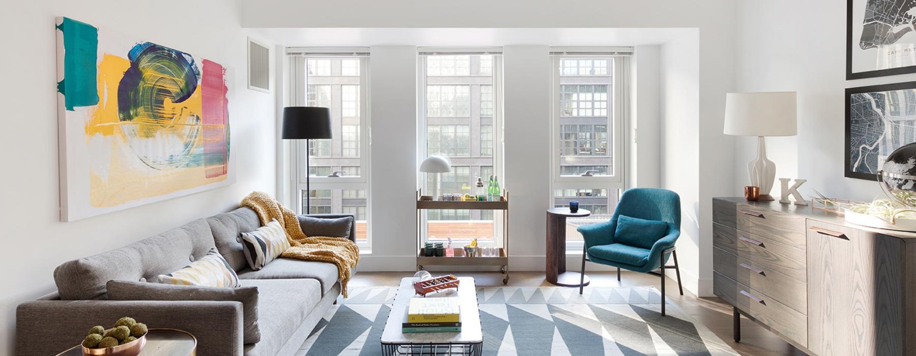 a living room with a couch and a table