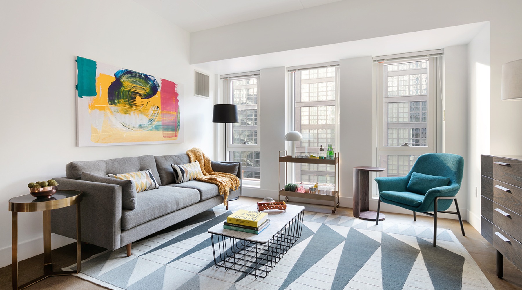 living room with a large window and open spaces